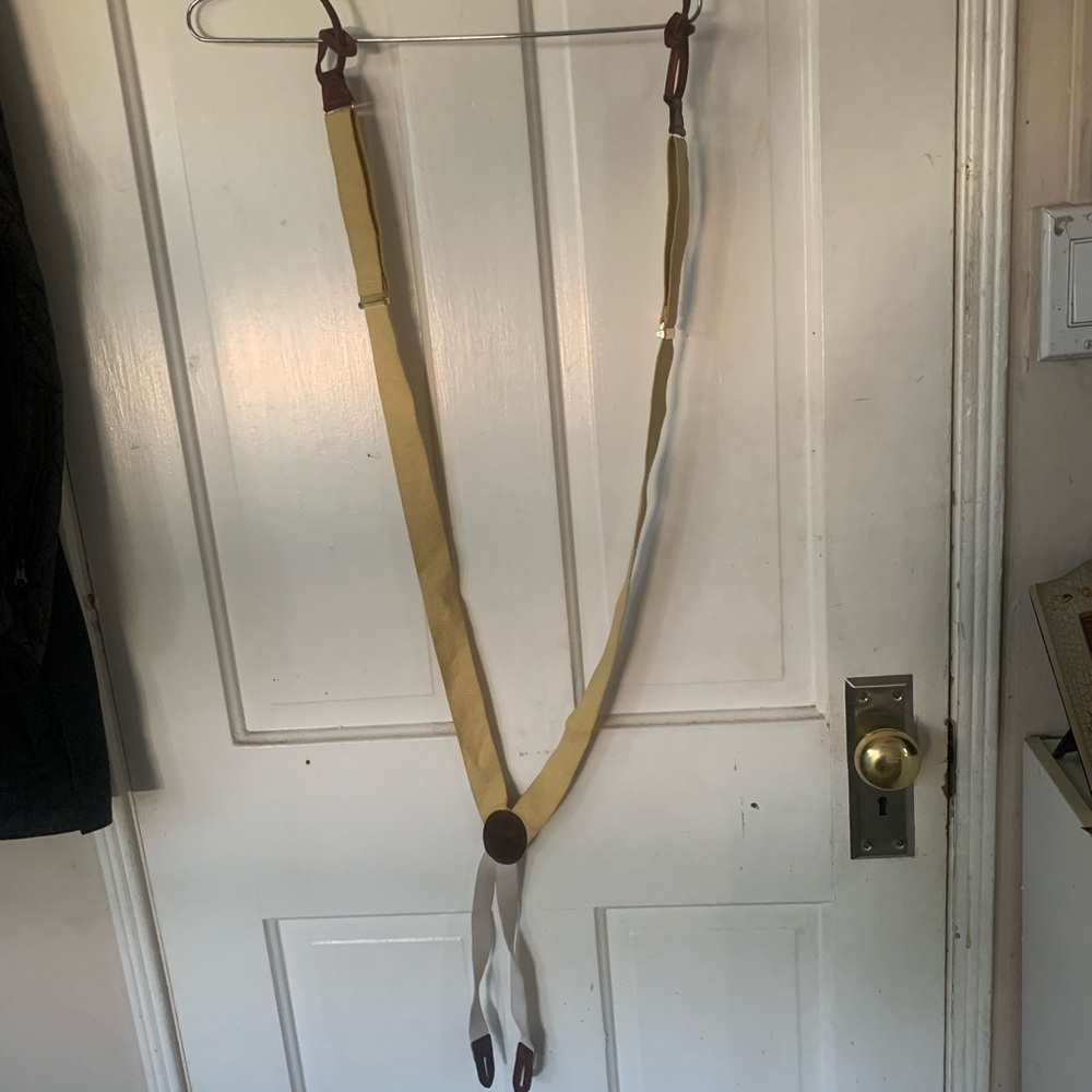 Yellow and white suspenders with leather straps
